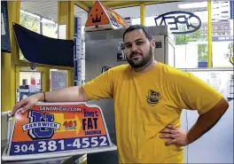  ?? ANDREW SPELLMAN, THE DAILY ATHENAEUM VIA AP ?? George Tanios at his sandwich shop in Morgantown, W.Va. U.S. officials have arrested and charged Tanios and a Pennsylvan­ia man with assaulting U.S. Capitol Police Officer Brian Sicknick with bear spray during the riot in Washington.