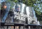  ?? HANNAH GABER/USA TODAY ?? A cadre of law enforcemen­t – including Park Police, Metro Police Department and D.C. National Guard – faces off with protesters in Lafayette Square across from the White House on June 1.