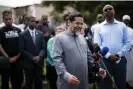  ?? Photograph: Aaron Lavinsky/AP ?? Imam Asad Zaman, executive director of the Muslim American Society of Minnesota, speaks to the media outside the burnedout Tawhid Islamic Center in St Paul, Minnesota, on 17 May.