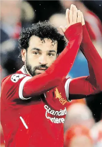  ?? Mohamed Salah v této sezoně nastřílel za Liverpool už 43 gólů. FOTO REUTERS ?? Kudrnatý postrach.