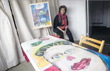  ?? Photograph­s by Brian van der Brug Los Angeles Times ?? SHEILA SCOTT-WILKINSON, executive director and founder of Theatre of Hearts, above, has samples of the program’s student artwork in her offices. The loss of NEA funding would affect operations substantia­lly.