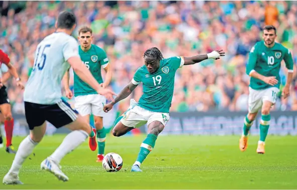  ?? ?? Republic of Ireland’s Michael Obafemi lashes home his side’s third goal against Scotland in Dublin.