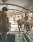  ?? PETER McCABE ?? Stephan Daoust drives his horses to the parking lot to pick up visitors to the Sucrerie de la Montagne.