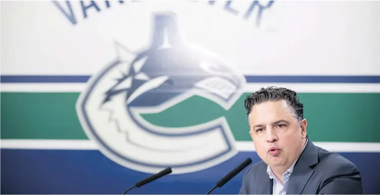  ?? — THE CANADIAN PRESS ?? Canucks head coach Travis Green says players have to perform better than they did last season and ‘everyone should feel pressure’ coming into camp.