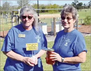  ?? STACI VANDAGRIFF/RIVER VALLY & OZARK EDITION ?? The Pope County Master Gardeners Plant Sale will feature an informatio­n table on beekeeping. Pattie Ward, left, raises bees at her apiary on Crow Mountain and will share informatio­n she has learned during the past three years as a beekeeper. Ward and Susan Colles show some of the items that will be on display.