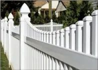  ?? Photo courtesy American Fence Associatio­n. ?? Vinyl fencing is rising in popularity as an inexpensiv­e, maintenanc­e-free alternativ­e to wood.