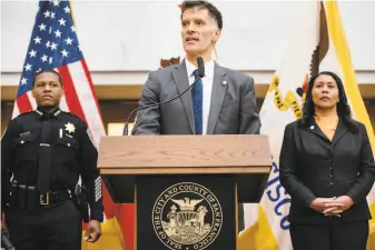  ?? Michael Short / Special to The Chronicle 2020 ?? Dr. Grant Colfax, San Francisco’s director of public health, flanked by Police Chief Bill Scott and Mayor London Breed, says shutting down the city was “a seismic shift in our thinking.”