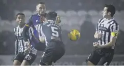  ??  ?? 0 Dundee United’s Nicky Clark is swarmed by St Mirren players.