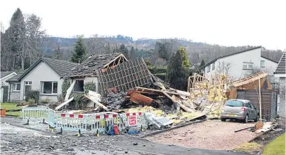  ??  ?? The scene after the explosion destroyed the Cunningham­s’ home in 2013.