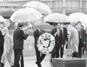  ?? U.S. EMBASSY ?? Rahm Emanuel, the U.S. ambassador to Japan, prepares to lay a wreath Saturday in Hiroshima, Japan.