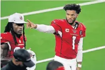  ?? AINSWORTH] [AP PHOTO/MICHAEL ?? Kyler Murray (1) points to fans in the stands in the first half Monday of Arizona's 38-10 win at Dallas.