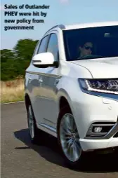  ??  ?? Sales of Outlander PHEV were hit by new policy from government