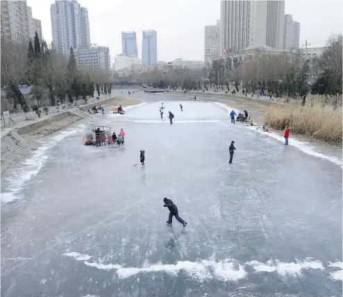  ?? WANG ZHAO / AFP / GETTY IMAGES ?? While hockey is a fringe sport in China, that could change if the NHL holds exhibition games there next season.