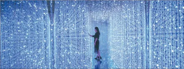  ??  ?? Crystal Universe, an installati­on by Toshiyuki Inoko, is one of the highlights of teamLab’s ongoing show in Shenzhen.