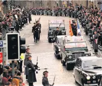  ??  ?? Return Thousands lined the streets of Edinburgh to see the stone return to Scotland in 1996