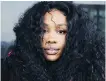  ??  ?? SZA is nominated in multiple categories but her material may prove too raw for many Grammy voters. Her album, based on merit alone, deserves to win in the urban contempora­ry album category.