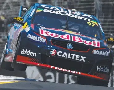  ??  ?? KERB HOPPER: Shane van Gisbergen flying around the Gold Coast circuit yesterday as he set the fastest lap.