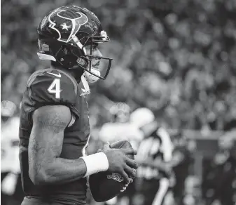  ?? Karen Warren / Staff photograph­er ?? Deshaun Watson passed for 4,165 yards and 26 touchdowns last season, though he was sacked a league-high 62 times and was knocked down another 132 times.