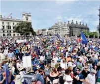  ?? AFP ?? Crowds arrive at Parliament Square during the People’s Vote march for a second EU referendum in central London. —