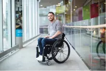  ??  ?? Brad Skeats, who has a spinal cord injury, poses for a photograph at the Blusson Spinal Cord Centre at Vancouver General Hospital, in Vancouver, B.C., on Wednesday.