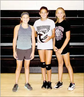  ?? MARK HUMPHREY ENTERPRISE-LEADER ?? Prairie Grove seventh-graders (from left): Rhiannon Umfleet, Kenleigh Elder, and Kendall Pickett are part of a large class of 40 out for Lady Tiger volleyball.