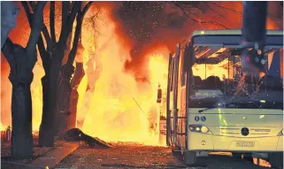  ??  ?? Flames engulf military buses after yesterday evening’s terrorist attack in Ankara