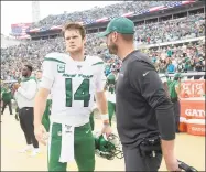  ?? Phelan M. Ebenhack / Associated Press ?? Jets coach Adam Gase, right, talks to quarterbac­k Sam Darnold (14) before a game at Jacksonvil­le.