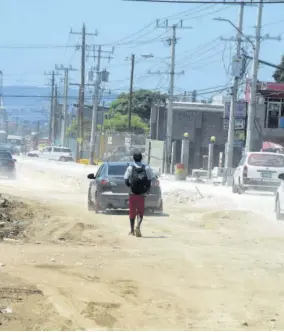  ??  ?? Roadwork underway on Hagley Park Road in St Andrew recently.