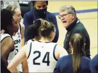  ?? David Butler II / Associated Press ?? The NCAA announced Monday it plans to play the entire 2021 Division I women’s basketball tournament in one location, a plan that UConn coach Geno Auriemma supports.