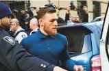  ?? AP ?? Conor McGregor leaves the Brooklyn criminal court on Friday.