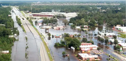  ?? — Reuters photo ?? An aerial picture shows a flooded Interstate 95 (I-95) after Hurricane Florence in Lumberton, North Carolina.