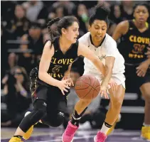  ?? JOSE CARLOS FAJARDO/ STAFF ?? Mitty’s Heleyna Hill guards Clovis-West’s Danae Marquez in the Open Division state championsh­ip in Sacramento. Mitty fell 44-40.