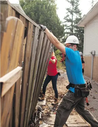  ?? HOLMES GROUP JORDAN PRESSEAULT/THE ?? Fences need the same care and maintenanc­e as your home in order to prevent safety hazards.