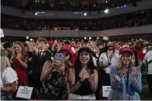  ?? Evan Vucci, The Associated Press ?? Supporters of President Donald Trump cheer as he arrives to a group of young Republican­s at Dream City Church on Tuesday in Phoenix.