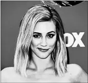  ?? FRAZER HARRISON/GETTY ?? Lili Reinhart, shown at Fox’s Teen Choice Awards on Aug. 12, plays Betty Cooper on The CW series “Riverdale.”