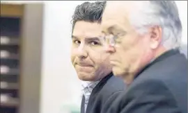  ?? Joshua Sudock
Pool Photo ?? ONETIME Santa Ana City Councilman Carlos Bustamante, left, in court with attorney Brent Romney, was ordered to register as a sex offender.