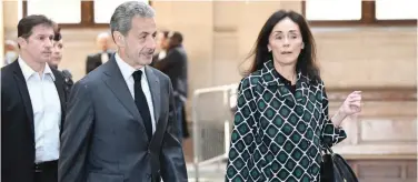  ?? Agence France-presse ?? ↑ Nicolas Sarkozy arrives at the courthouse with his lawyer Jacqueline Laffont at the Paris courthouse on Wednesday.