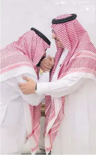  ?? AL-EKHBARIYA VIA AP ?? Mohammed bin Salman, newly appointed as crown prince, left, kisses the hand of Prince Mohammed bin Nayef in Mecca, Saudi Arabia on Wednesday.