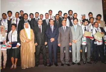  ?? —KUNA ?? A group photo of outstandin­g Kuwaiti students and graduates of Egyptian Universiti­es honored at Kuwaitís cultural office in Cairo.