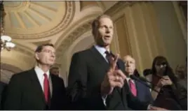  ?? ASSOCIATED PRESS ?? Sen. John Thune, R-S.D. speaks on Capitol Hill in Washington, May 16. Republican­s are touting lower premiums under their health care legislatio­n, but that reflects insurance that would cover a smaller share of the cost of medical bills.