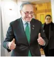  ?? AFP-Yonhap ?? Senate Majority Leader Chuck Schumer (D-NY) gives a thumbs-up as he arrives for a press conference after the Senate passed a foreign aid bill, Washington, D.C., Tuesday.