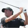  ?? JON SUPER/THE ASSOCIATED PRESS ?? Kevin Kisner took just 22 putts en route to a 5-under 66 on Thursday at Carnoustie.