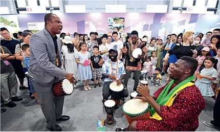  ?? (XINHUA) ?? Sta- members perform at an exhibition booth of the Ghanaian Embassy in China during the 2023 CIFTIS on 2 September