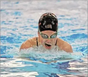  ?? TOP PHOTOS AND LEFT PHOTO: DIGITAL FIRST MEDIA FILE; BOTTOM RIGHT PHOTO COURTESY AVON GROVE ?? At top left: Avon Grove’s Sydney Paglia, here during the 100 Butterfly at the district championsh­ips — helped the Red Devils clinch the crown, albeit unofficial­ly. At top right, Emma Brinton was all by herself at the state meet three years ago. Sunday...