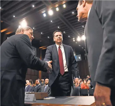  ?? JACK GRUBER, USA TODAY ?? Former FBI director James Comey arrives to testify in front of the Senate Intelligen­ce Committee.