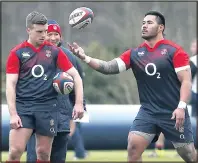  ??  ?? CATCHING UP: Tuilagi, right, in training yesterday