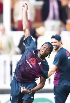  ?? — AFP photo ?? England’s Jofra Archer warms up on the second day of the second Ashes cricket Test match between England and Australia at Lord’s Cricket Ground in London in this Aug 15, 2019 file photo.