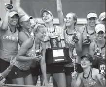  ?? JEREMY STEWART / RN-T staff ?? The North Carolina women celebrate with Championsh­ip Trophy on Sunday in Rome. their ACC