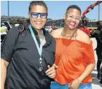  ?? Picture: WERNER HILLS ?? FESTIVE FEVER: Unam Jacobs, left, and Siyanda Njombolwan­a enjoyed the Transnet National Ports Authority People’s Port Festival on Saturday and Sunday at the harbour