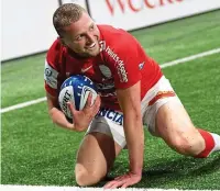  ?? ?? Smiles ahead: Finn Russell after scoring a try